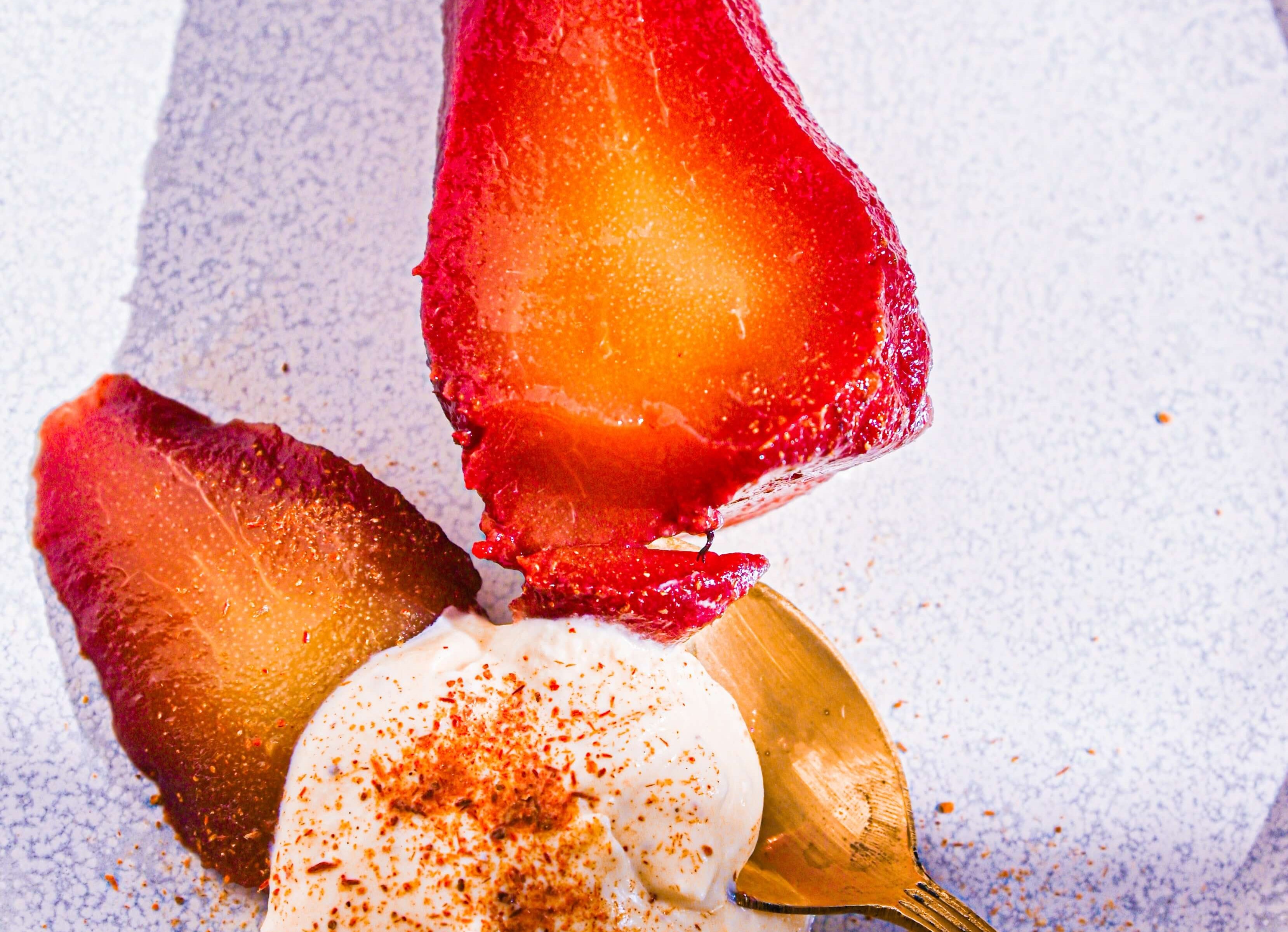 Poached Pears In Spiced Wine With Cinnamon Cream