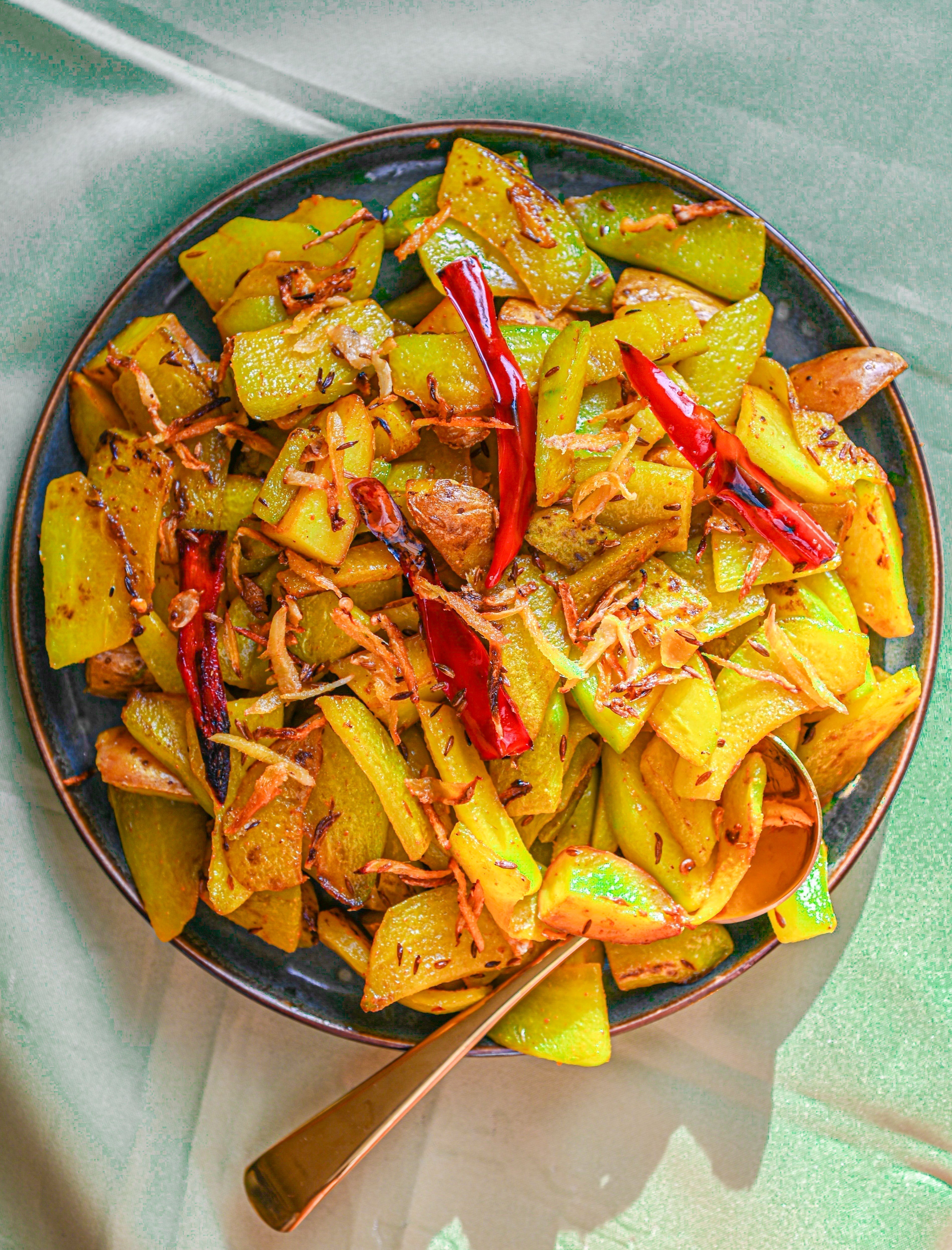 Sautéed Chayote & Pink Fir Potatoes with Lakadong Turmeric, Cumin & Crispy Loire Ginger